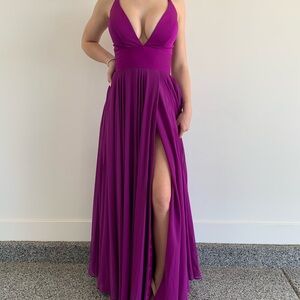 purple prom dress with high slit and open back